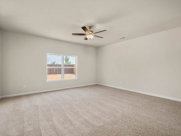 The family room is spacious and ready for your family hangouts.