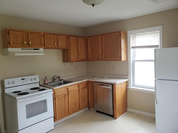 Kitchen with recent appliances and new dishwasher