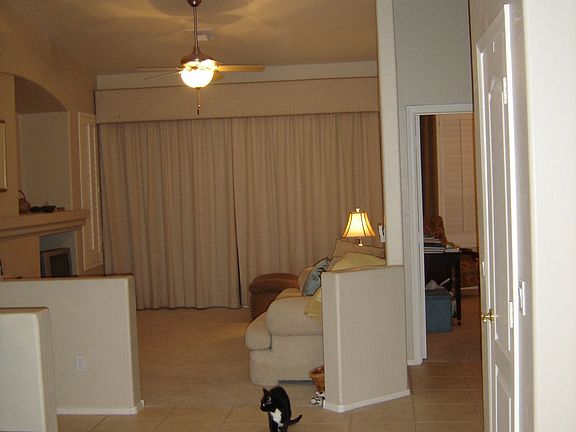 View from dining room into living room, downstairs master BR