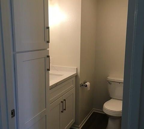 Newly remodeled bathroom with white shaker cabinets