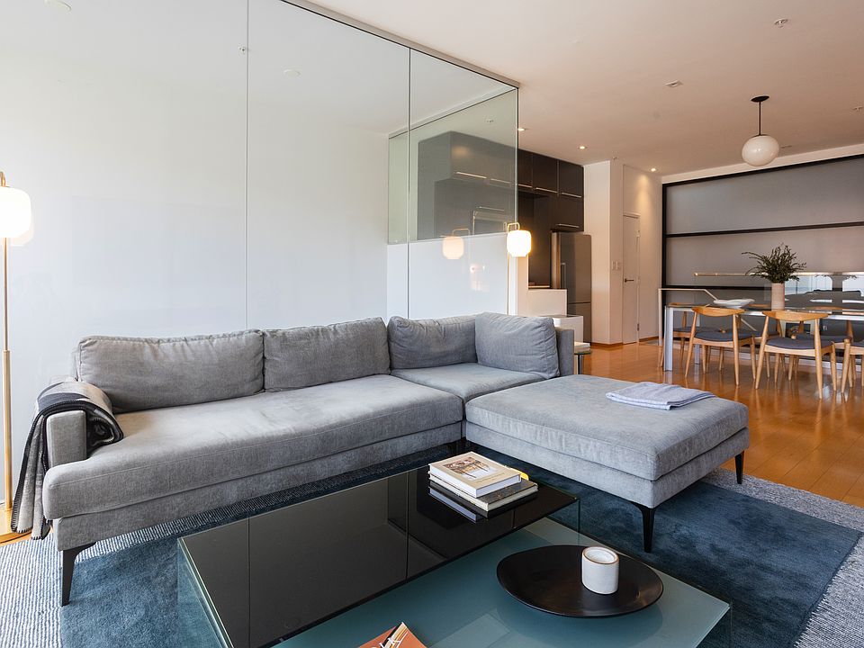 Abundant light with floor to ceiling windows and glass walls.