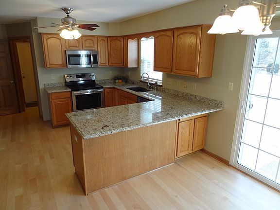 Open Kitchen with Stainless Steel Appliances