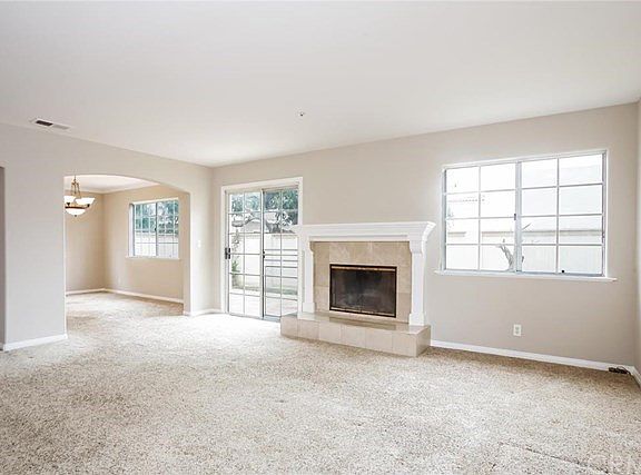 Living Room to Dining area and Slider to private back yard