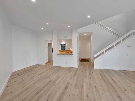 Kitchen and stairway, from living room