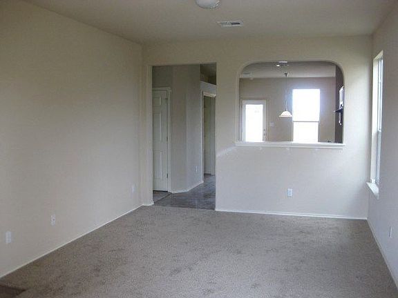 Family room with pass-thru bar and lots of natural light
