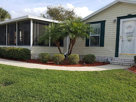 beautifully landscaped, lush green grass