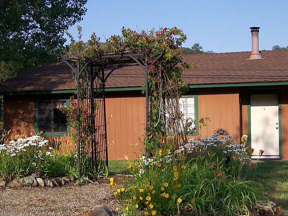 Arbor from gravel drive