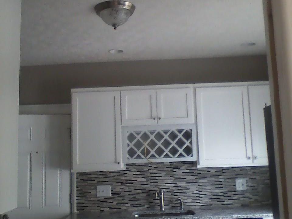 View of kitchen from dining room pocket door. New kitchen wi