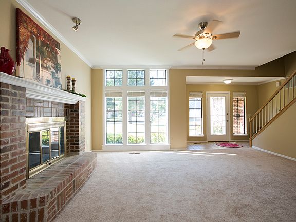 Wall of windows & leaded glass door