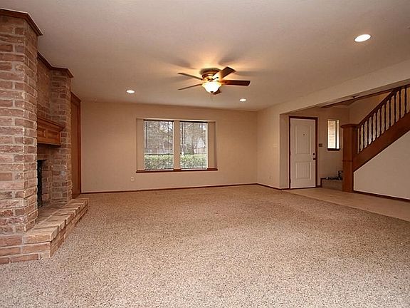 Living Area w/beautiful brick fireplace