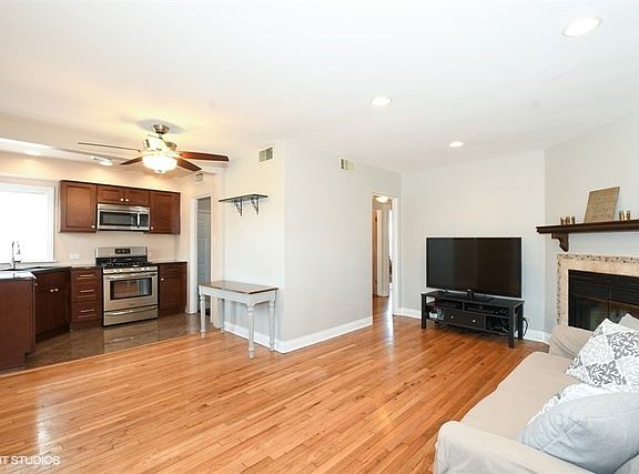 4th image of 5562 N Leonard Ave