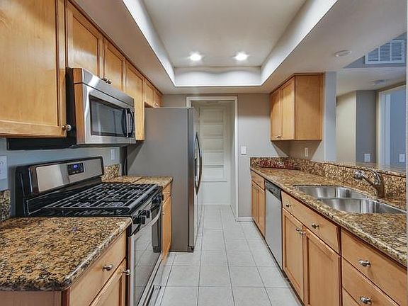 5th image of 9419 Fairgrove Ln Unit 105
