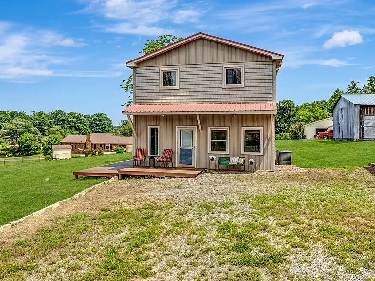 Welcoming front porch & ample parking