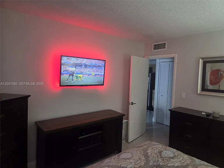 4265 NW South Tamiami Canal Dr #1-208 — Photo 14