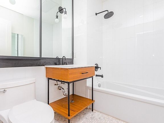 5th image of 55-27 Myrtle Ave #207