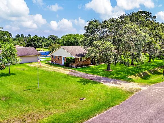 The three car garage offers room for plenty of storage. You can also park your RV here. There are electrical hook-ups too.