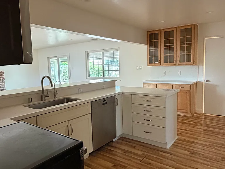 Kitchen updated 3-4 years ago. Reverse Osmosis tap next to sink faucet.