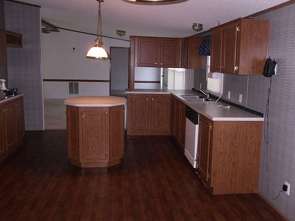 looking from laundry room into living room