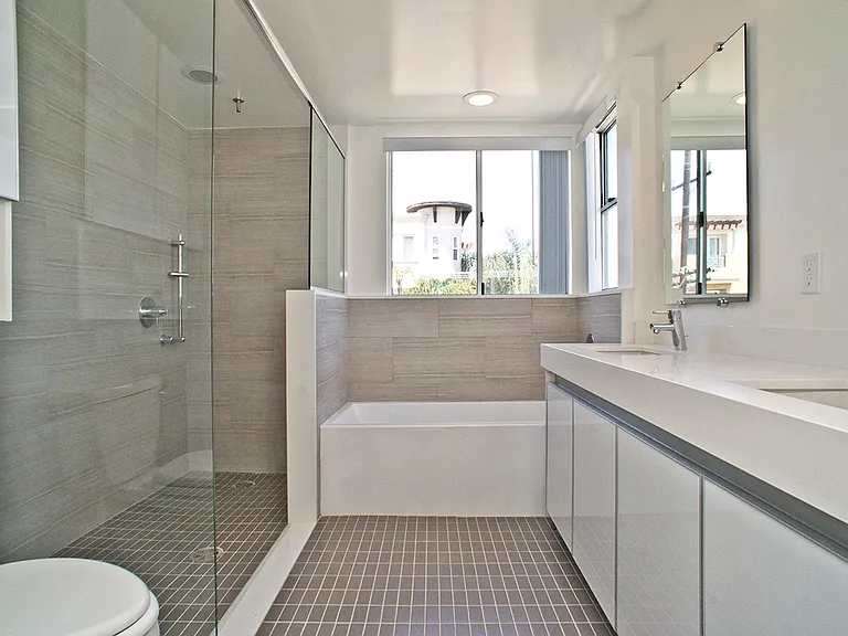 Master Bathroom with Double Sinks, Full-Size Bathtub, and Walk-In Shower