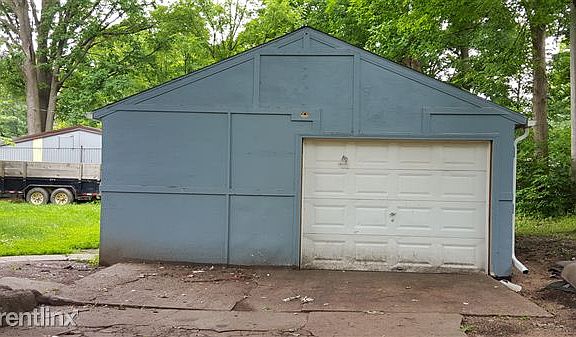 Garage in the back of home.