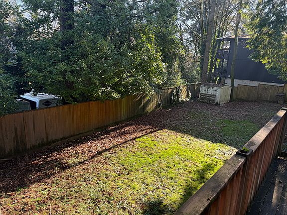 Large backyard with storage shed