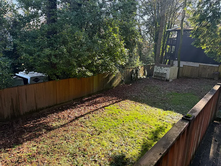 Large backyard with storage shed