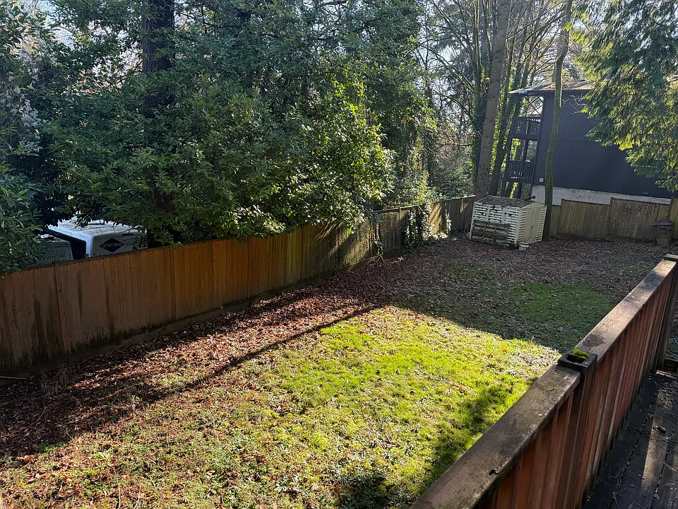 Large backyard with storage shed