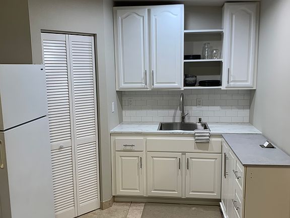 Newly Rennovated Kitchen with Rolling Island

Rolling Island includes 2 burner stove top and microwave