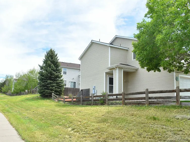 5542 S Quemoy Cir — Photo 3