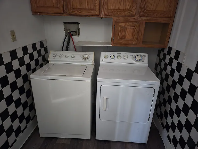 Washer dryer on first floor next to the kitchen