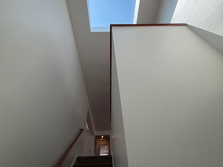 Large skylight at top of stairs