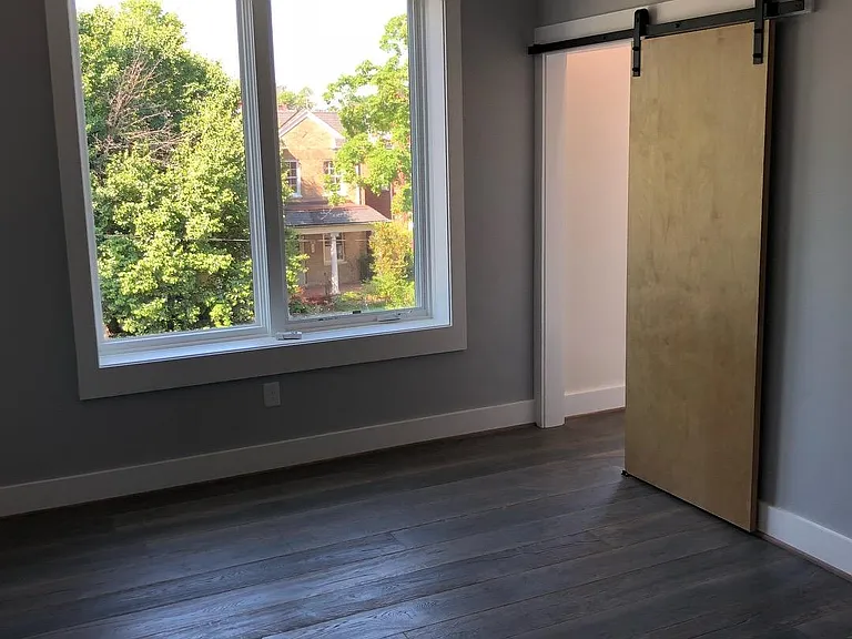 2nd floor bedroom #1 with barn door closet to walk-in closet