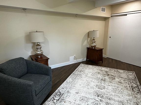 Living room - a brand new West Elm sofa is ordered and will fill the space