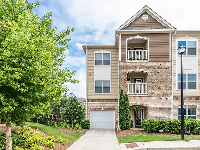Exterior Apartment View with Attached Garage