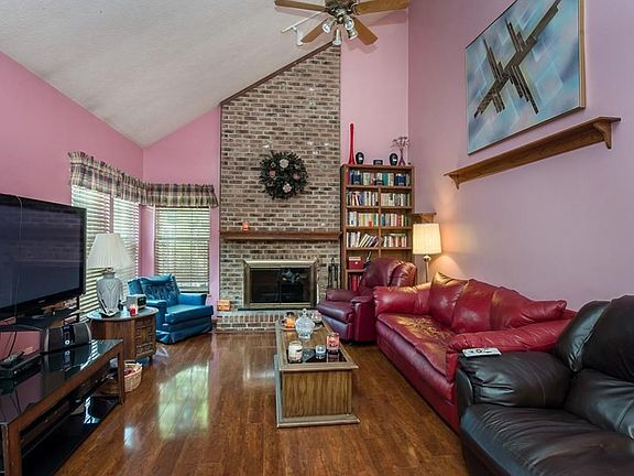 Great room with soaring ceilings and fireplace!