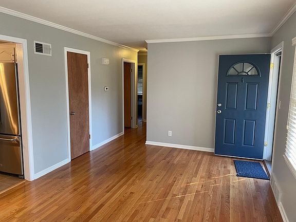 Front Living Room and Hallway to Bedrooms / Full Bath
