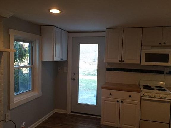 Front door has mini blinds between the glass. Plenty of cabinet/storage space