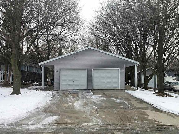 Updated garage doors with openers for each.