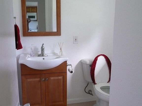 1/2 Bath/Powder (please note, prior tenant's content items in photo not included with home)