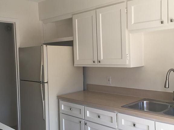 Full sized refrigerator; freshly painted, canned lights