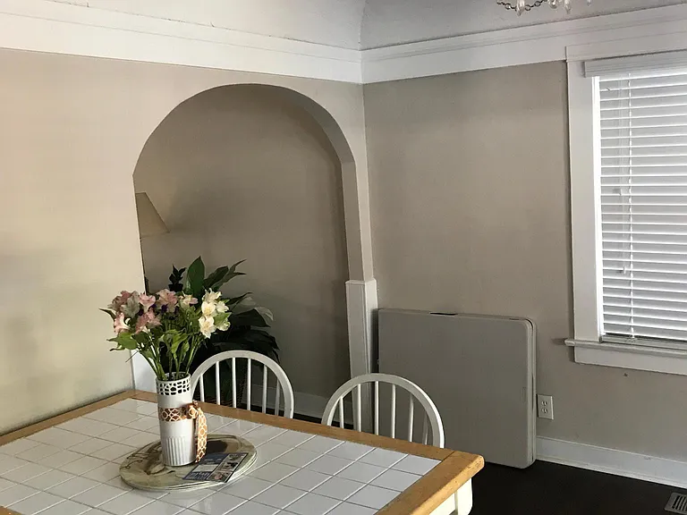 Dining room w chandelier.