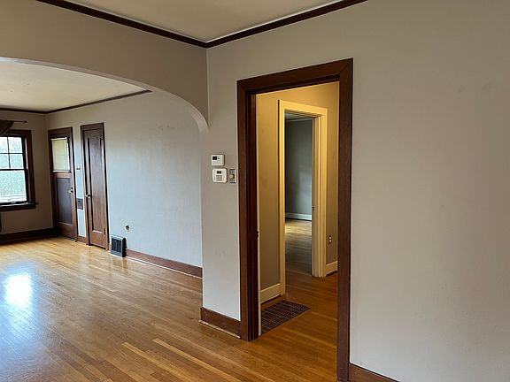 A glimpse down the hall to Main floor bedroom