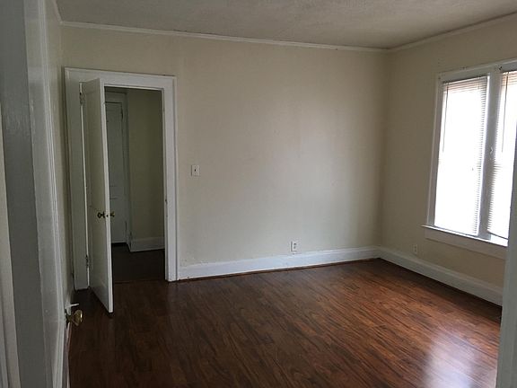 large dining room and/or office with doors at both openings