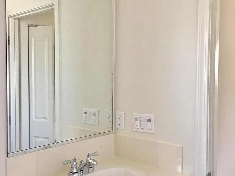 Shared full bath on the second floor is very clean, well lighted and conveniently located next to the laundry.