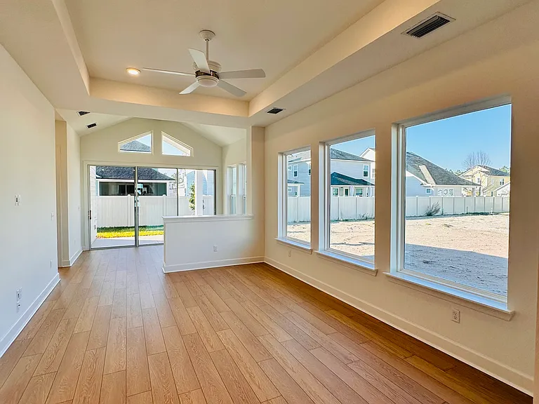 expansive living room and sunroom