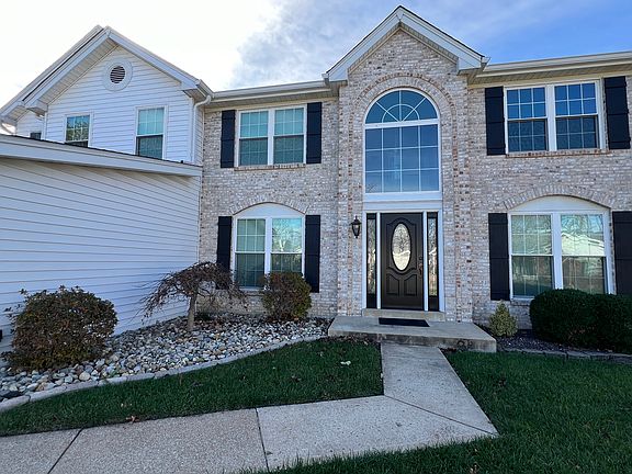 Inviting entry professionally landscaped