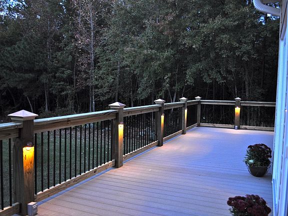 Deck on back of house at dusk