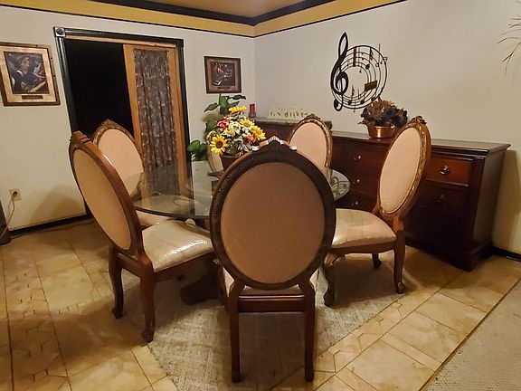 Lovely 6 chair Dining room glass set