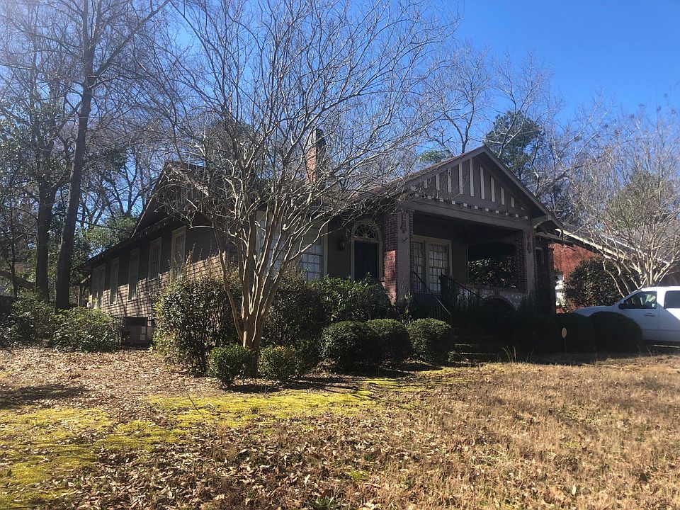 Beautiful front porch and landscaping.