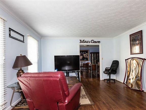 Ample living room. Attractive hardwood floors featured through most of the common areas.